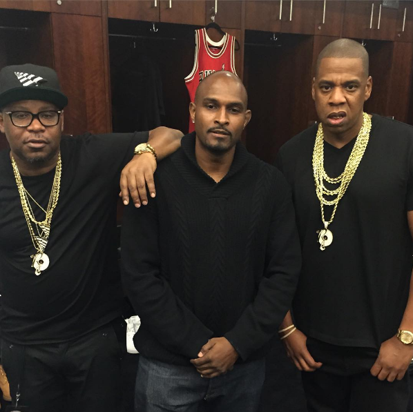 aintnojigga:  Jay Z, Emory Jones, and the President of Headliner Market Group Mike