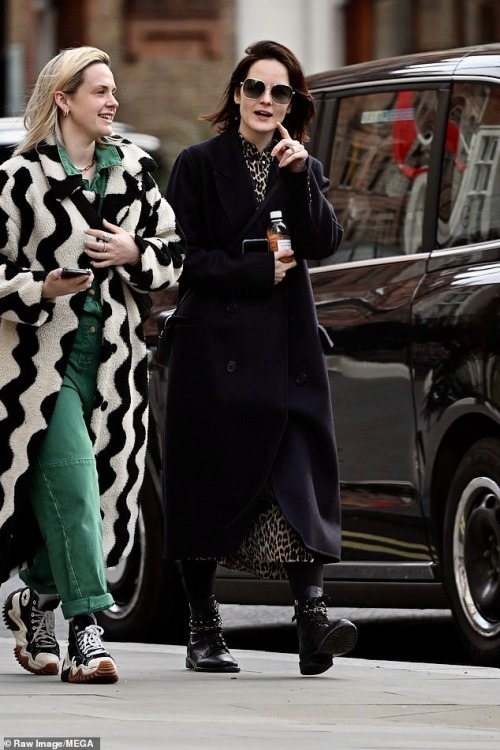 Michelle Dockery and friend on the town yesterday with enormous engagement ring.