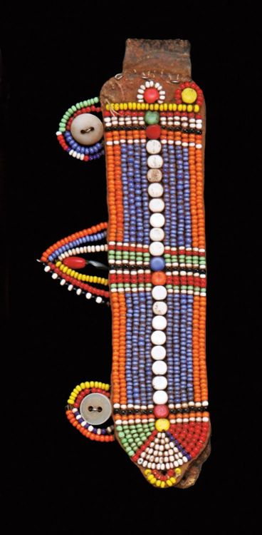 Beaded Earflaps from the Masai people of Kenya. 20th century,Leather embroidered with glass beads an