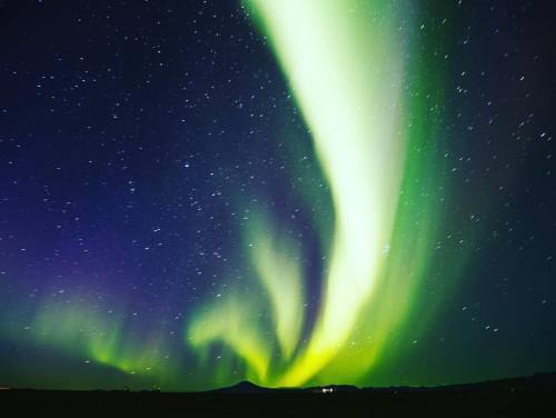 Northern lights last night rising up behind Hekla volcano! #hotelranga #iceland #northernlights (at 