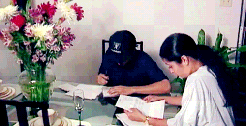 selenaqgifs:   When [Chris’s dad] came back to the kitchen, Selena and I were paying bills. We both had our checkbooks out on the kitchen table. Seeing that made my dad laugh and get his camera. “Here,” he said, aiming the camera in our direction.