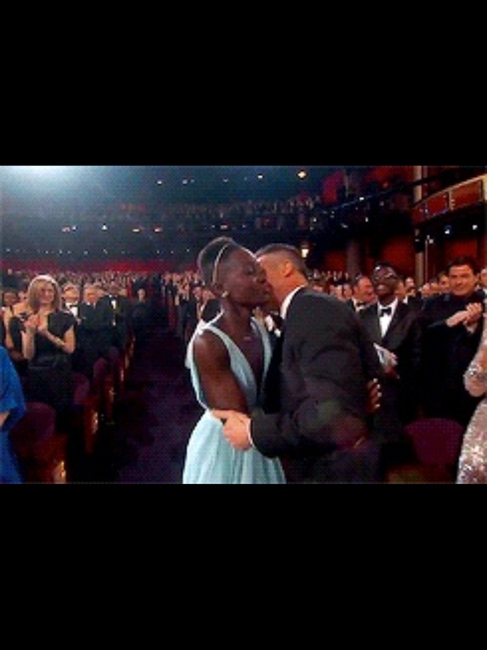madschristoph:  Lupita is literally living the dream with all of that man candy.