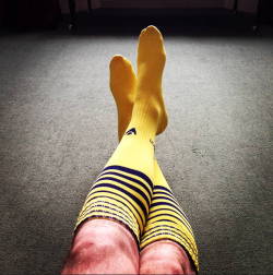 Men in rugby and footy socks