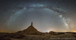 astronomypictureoftheday:   Milky Way Over Spain’s Bardenas RealesWhat’s that below the Milky Way? First, across the top of the above image, lies the faint band that is our planet’s sideways view of the central disk of our home Milky Way Galaxy.