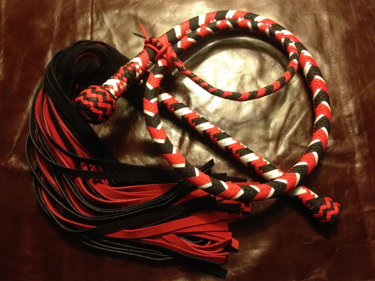 bdsmgeek:  edgeplay-co-uk:  Harley Quinn themed whip and flogger. Only one of each
