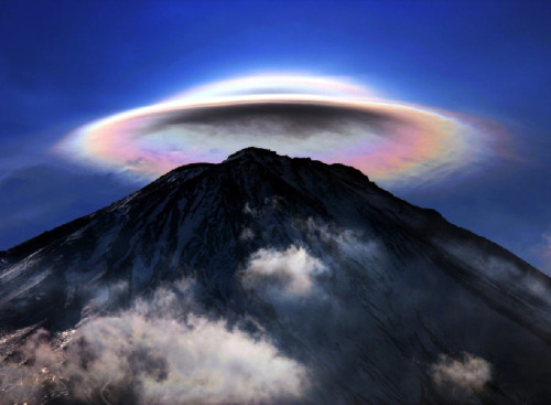 thekimonogallery:Rare atmospheric anomaly above Mt Fuji, Japan.  Photography by Sekine’s Motoharu