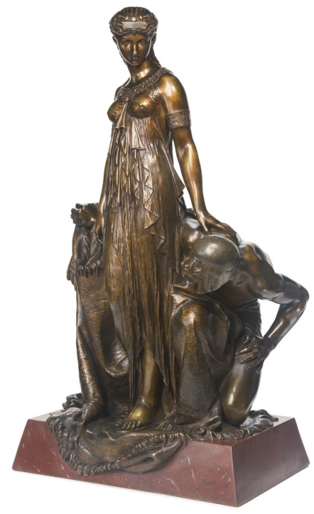 tiny-librarian:Bronze statue of Cleopatra; her pose is based on the famous painting of Cleopatra and