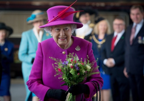 Queen Elizabeth II arrives at Plymouth Railway Station as she visits the city on March 20, 2015 in P