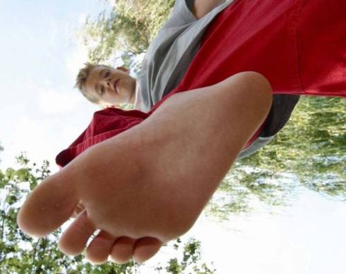 teenjockfeetandsocks:Everytime you lay on the ground, you ask me to step on your face? You like my f