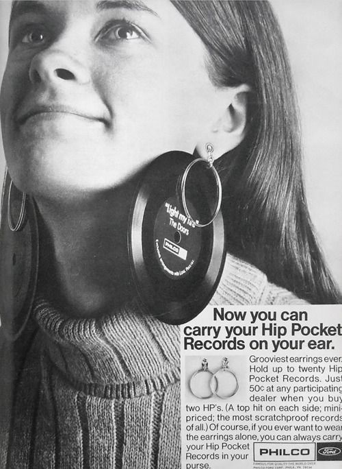 devilduck:   Grooviest earrings ever. Now you can carry your records on your ear.  
