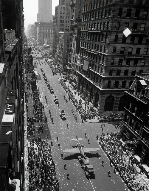 Model of plane on float in “New York at War” parade, New York City, 1942. Andreas Feininger. Gelatin