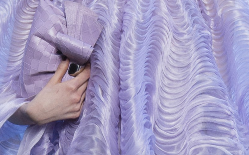 Soft lilac pleats at Armani Privé.