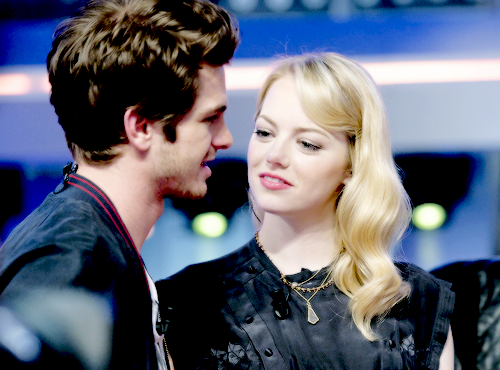 stonefieldofdreams:  9 photos of Emma Stone looking completely in love with Andrew