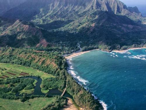 Hanalei Bay, on the north shore of the Hawaiian island of Kauai, from the air. #questioneverywhere #