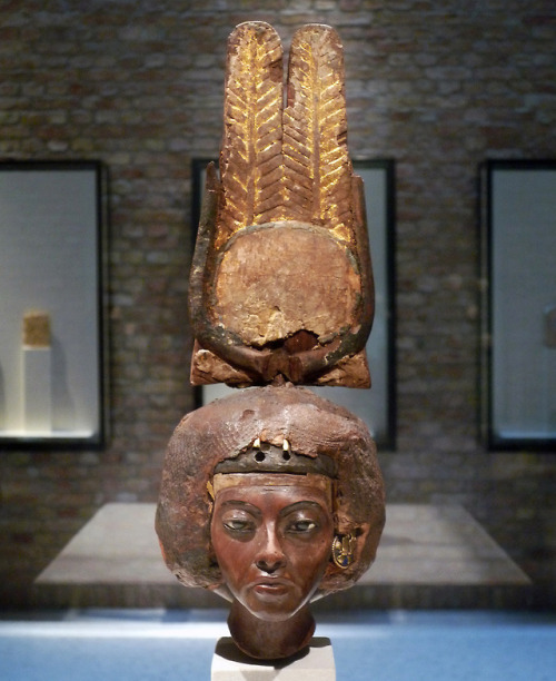 Queen Tiye’s head with a feathered crown from the Amarna Period (18th dynasty), yew wood, lapis lazu