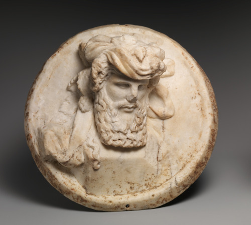 greekromangods: Disk with a herm of Dionysos in relief Roman; Early Imperial, 3rd quarter of 1st cen