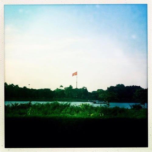 #magical view from the pool of @laresidencehue : a local boat on the Perfume River and the Citadel o