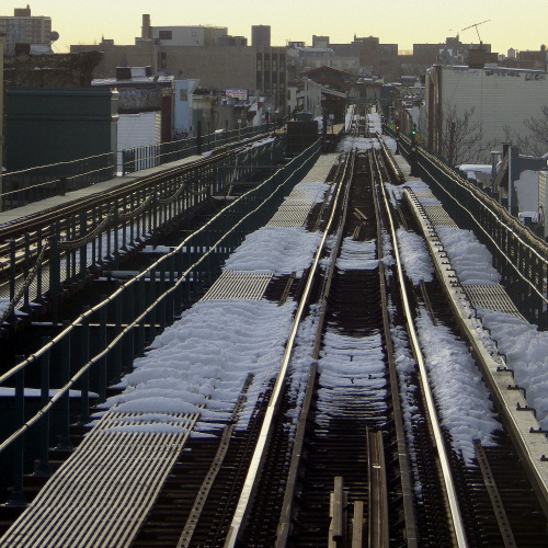 wanderingnewyork:  Looking out the front of a J Train.