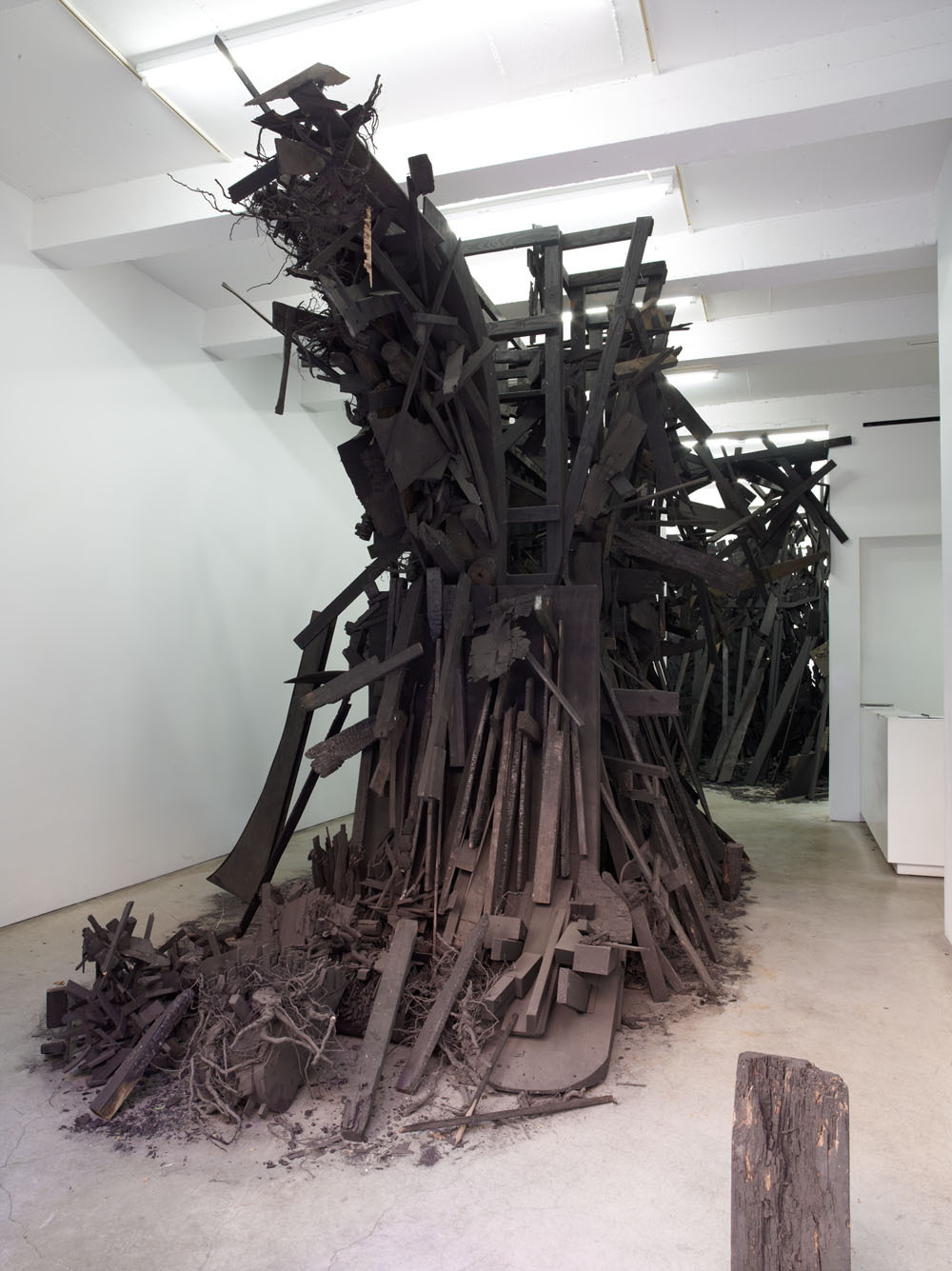 nearlya:  Leonard Drew.Site specific installation, 2012,  Burnt wood, paint, dimensions