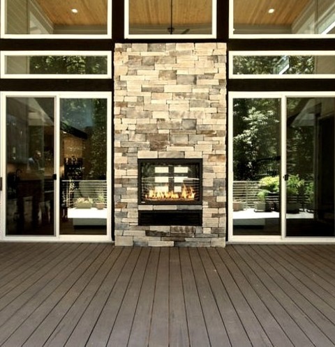 Covered - DeckInspiration For A Huge Modern Backyard Ground Level Cable Railing Deck Remodel With A Fireplace