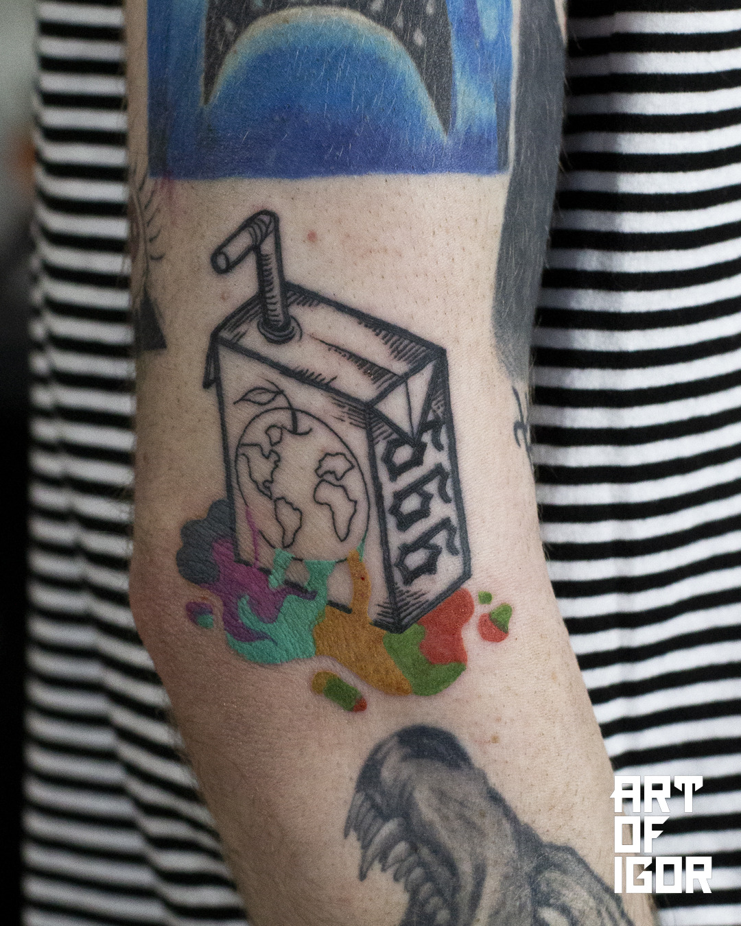 Single needle juice box tattoo located on the inner