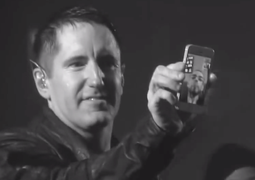 the-prettiest-hate-machine:  iforgothowtonormal:  Trent Reznor FaceTimes a fan live on stage, who was diagnosed with cancer and had a few weeks left to live. “As your time is running out, let me take away your doubt. We can find a better place in