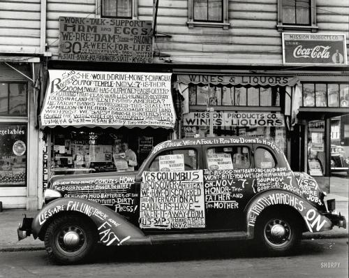 historylover1230:San Francisco, 1938. “Yes, Columbus Did Discover America!” A jeweler (and car) with