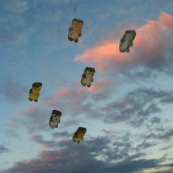 Laughingsquid:  Playful Photos Of Gummy Bears Flying On Car Windshields