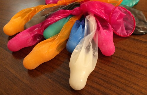 bestpiece:  Eight loads of frozen cum in colorful condoms 