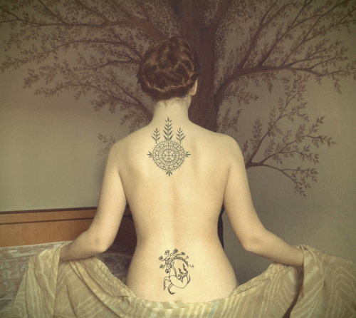 My tattoos finally healed! (: Traditional croatian design of the tree of life on the upper back, and