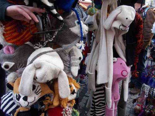 Various clothes for winter offered during Christmas market 2021 in the city Wroclaw, Poland.