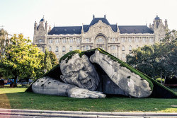 littlelimpstiff14u2:  Giant Sculpture Crawls Out Of The Ground In Budapest, by HERVÉ-LÓRÁNTH ERVIN    This head turning sculpture is located in Széchenyi Square in Budapest, Hungary. It was created for the Art Market Budapest 2014 International