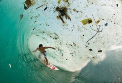 lowersleft:  This is a more realistic approach of what surfing really is…especially around California. Not those perfect crystal blue waters and white sand they market around. 