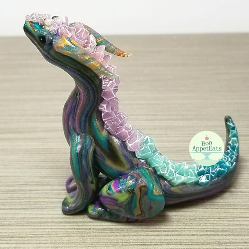 battlecrazed-axe-mage: bon-appeteats: Custom order for a peacock colored dragon with crystals. Swipe