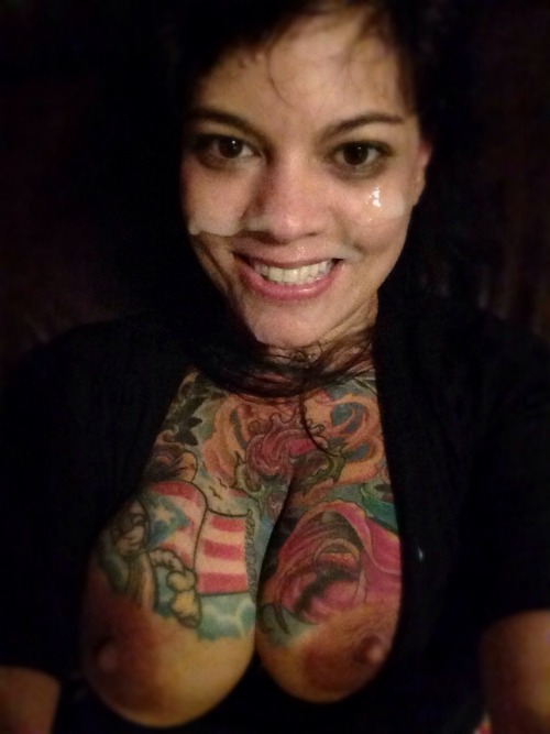 jizznation:  A stunning tattooed lady gets a facial from her man  -  sinfordaddy