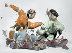 mma-gifs:  mymodernmet:  Photographer Martin Klimas captured the exact moment of these kung-fu porcelain figurines shattering on the ground, resulting in chaotically beautiful images.   seems a shame to destroy the figures but a brilliant result 