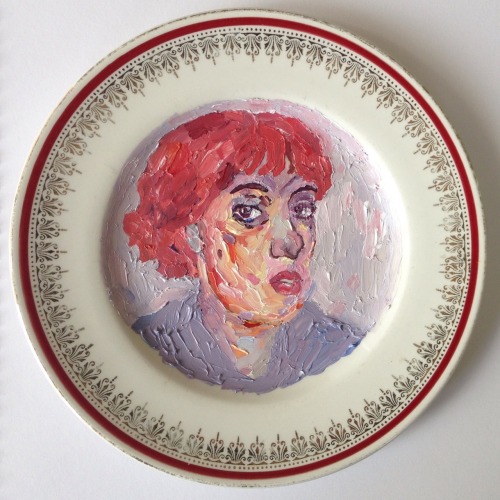 A self portrait on a china plate