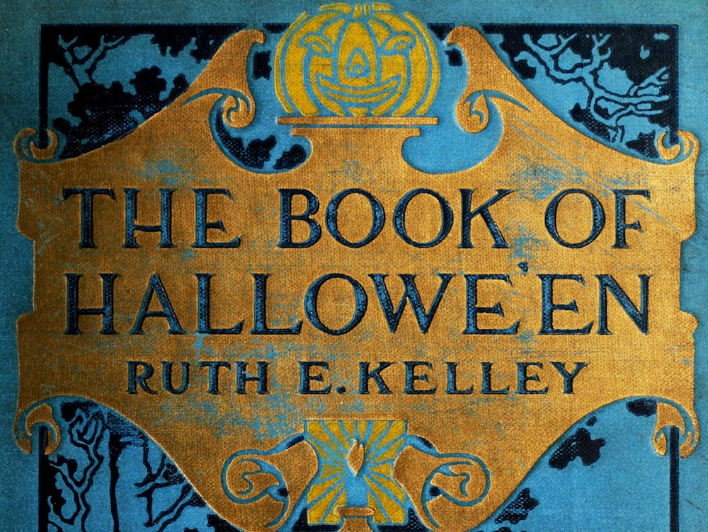 The Book of Hallowe'en vintage book cover with a jack o'lantern and gold and turquoise Gothic flourishes.
