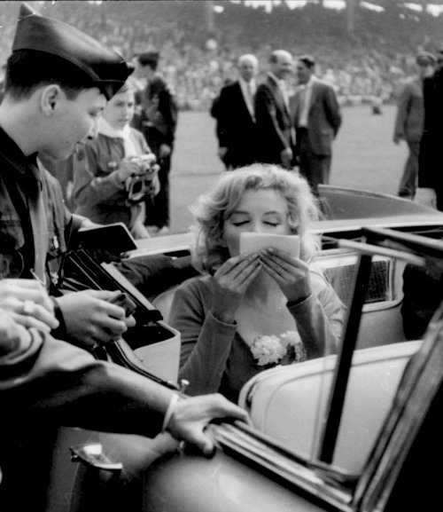 alwaysmarilynmonroe: Marilyn spending time with fans at an appearance at Ebbets Field on May 12th 1957. 