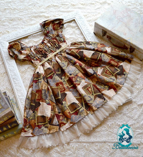 To the Library OP “This dress is made with a rich book fabric with ivory lace accents. It fea