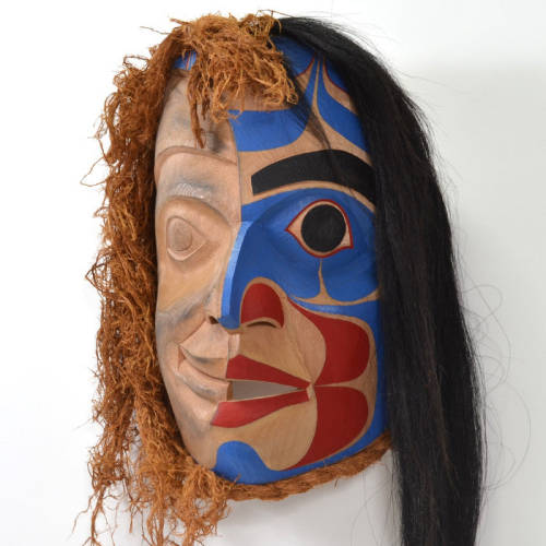 formlines:Natural Beauty Ian Reid from the website:This mask depicts two different times i