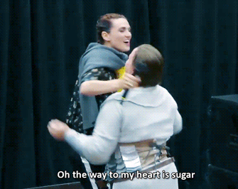 fierceheda:   Katie McGrath getting Pineapple Lumps from a fan (x)