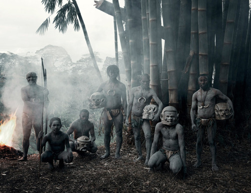 The Chimbu Tribe of Papua New Guinea (top)The Asaro Mudmen of Papua New Guinea (bottom)
