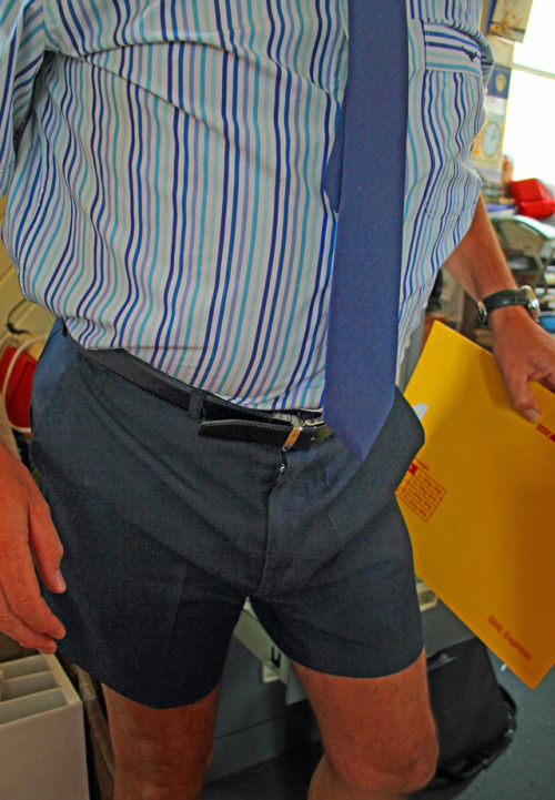 Another in the office summertime in NZ…great bulge     packing some heat in there