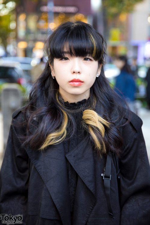 20-year-old Noe on the street in Harajuku wearing a dark winter look with a long coat by Perverze ov