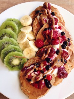 tobefre-ed:  Vegan protein pancakes with soy yogurt, mixed berries, almond butter, a banana and a kiwi!