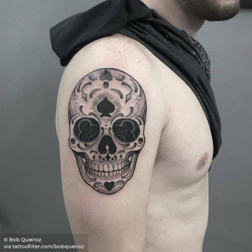 By Bob Queiroz, done in São Paulo. http://ttoo.co/p/36152 anatomy;blackwork;bobqueiroz;dia de muertos;facebook;gambling;game;human skull;illustrative;medium size;mexican;patriotic;skull;twitter;upper arm