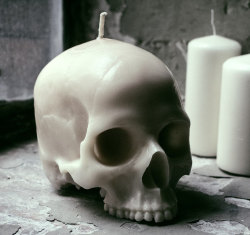 sosuperawesome:  Life-size Skull Candles