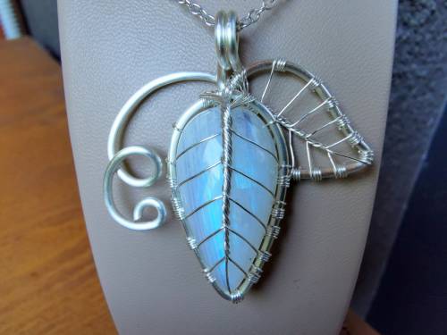 Leaf with vines pendant made with a moonstone :).You can order it at my Etsy shop: https://etsy.me/2