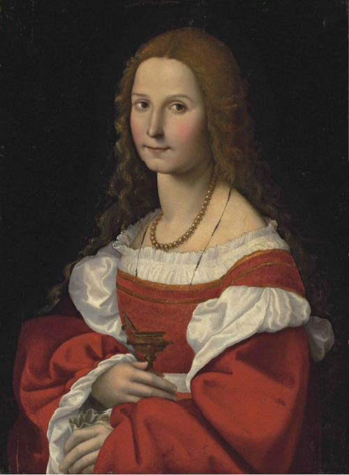 Portrait of a lady as Mary Magdalene, half-length, in a red dress and pearl necklace. Attributed to 